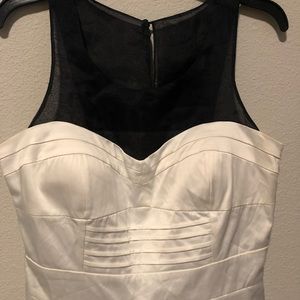 Satin and sheer black paneled dress